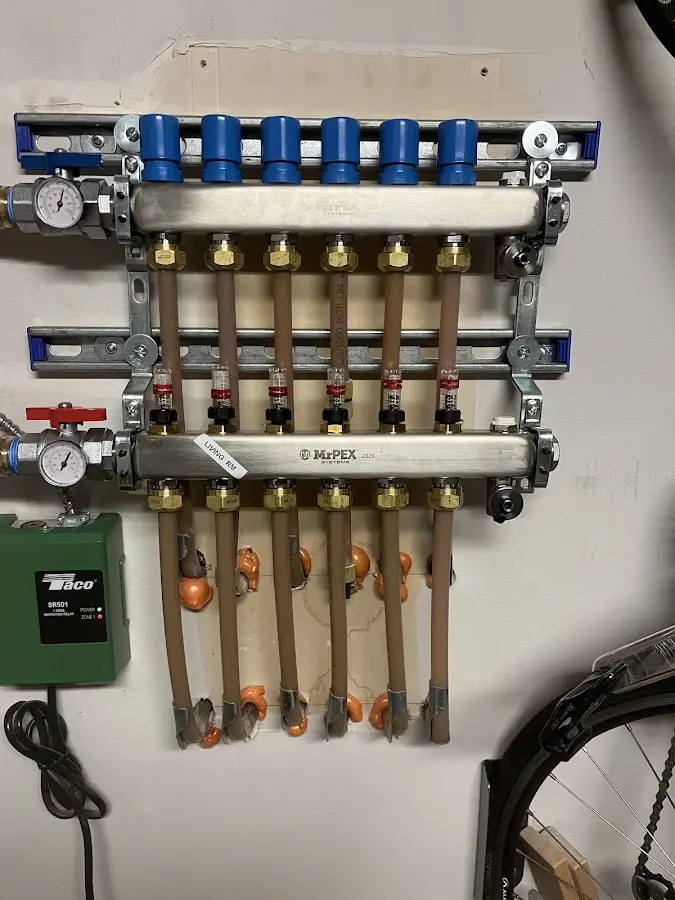 Plumber performing Leak Detection at a residential property in Massapequa Park